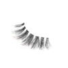 Natural black eyelash extensions with varying lengths for a fuller look, enhancing eye beauty and elegance.