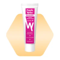 Pearlie White DentureFit denture adhesive cream in fresh mint flavor, offering extra strong holding power and long-lasting hold.