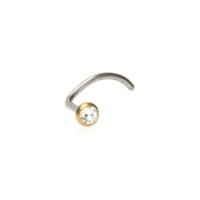 Gold and silver nose stud featuring a clear crystal, perfect for body jewelry enthusiasts and fashion accessories.