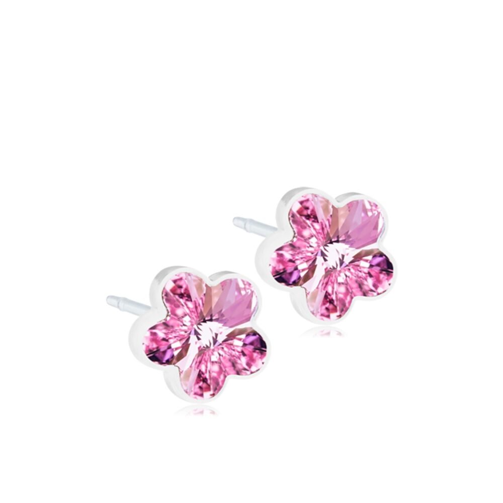 Pink flower-shaped stud earrings featuring sparkling crystals, crafted with a silver setting for elegance and charm.