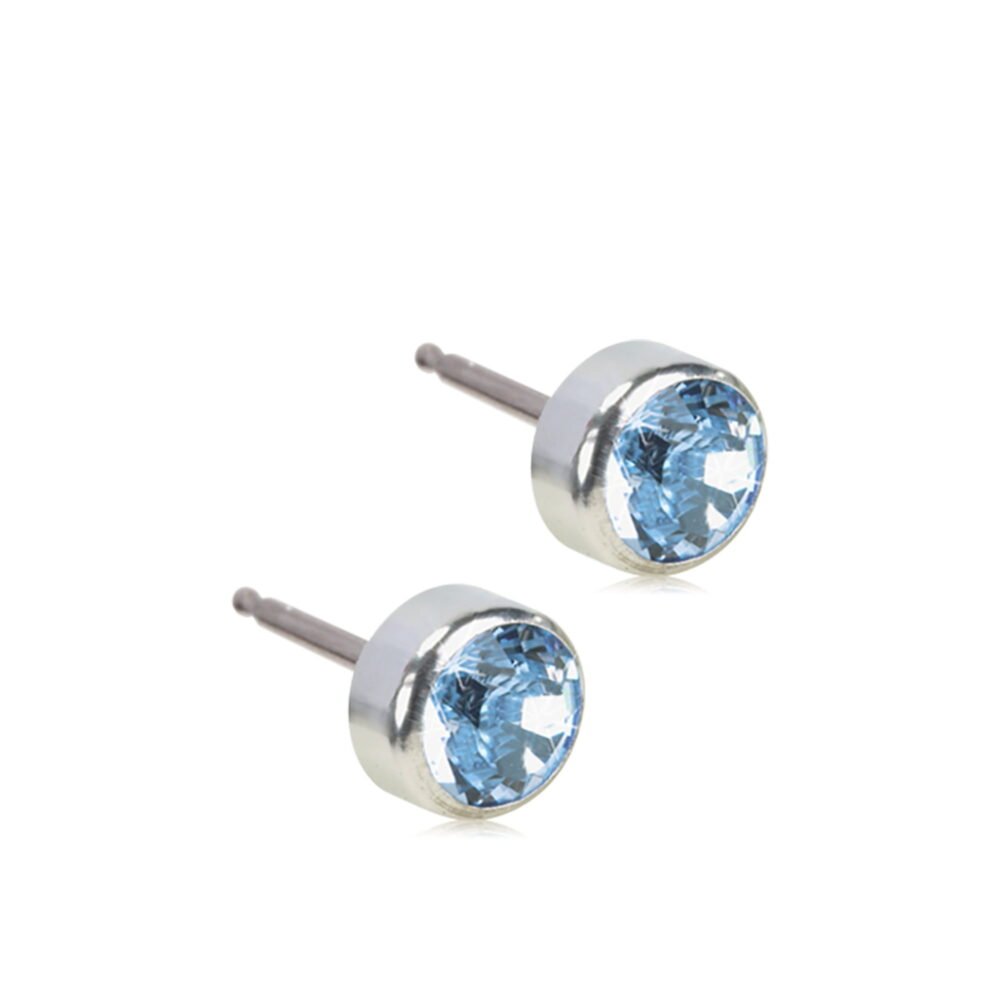 Elegant blue crystal stud earrings with silver settings, perfect for adding a touch of sparkle to any outfit.