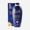 Fair & White Exclusive Whitenizer body lotion with Vitamin C, 500ml, in blue bottle with packaging, designed for skin brightening.