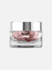 KLAPP Beauty Capsules containing skin-refining Vitamin C serum, designed for skincare routines, enhancing skin texture and radiance.