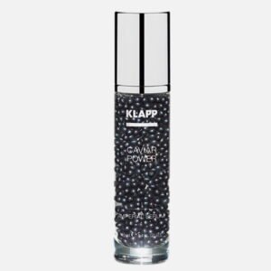 KLAPP Caviar Power Imperial Serum in a sleek bottle with black caviar beads for skin rejuvenation and hydration.